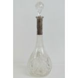 A Eugen Marcus cut glass decanter having 800 silver collar, with stopper,