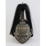 A high ranking Staffordshire Yeomanry (Queens own Royal Regiment) black leather on metal helmet