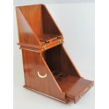 A contemporary mahogany six bottle champagne or wine bottle and glass cabinet,