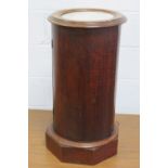 A single cylindrical marble top pot cupboard raised over octagonal base, 73cm high, 36cm diameter.