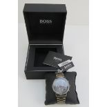 A Hugo Boss stainless steel wristwatch in as new unworn condition complete with box and papers,