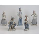 Five Lladro style porcelain figurines including two clowns.