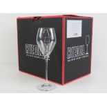 A box of six new and unused Riedel champagne glasses, each standing 24cm high.