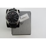 An Emporio Armani stainless steel wristwatch in as new unworn condition complete with box and