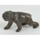 A bronze bear cub measuring 7cm in length. Unmarked.