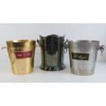 Three metal branded champagne ice buckets; Louis Roederer (x2) and Pol Roger.