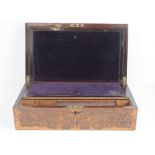 A 19th century inlaid writing slope, lid lifting to reveal compartment within. 40cm wide.