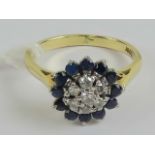 A 18ct gold diamond and sapphire floral cluster ring,