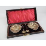 A pair of HM silver salts complete with spoons in original fitted leatherette box,