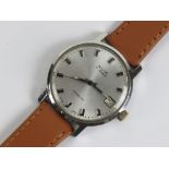 A c1970s Avia manual wind wristwatch, stainless steel 36mm case, silvered dial with date aperture,