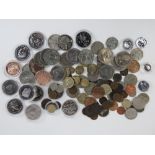A quantity of commemorative coins including ten crowns in protective pods, sixteen loose crowns,