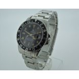 A 1986 Rolex GMT Master Gents watch ref.16750. Signed 40mm steel case with serial 8901043.
