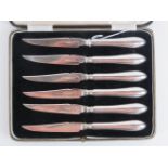 A set of six HM silver fruit knives each having hallmarked blades and handles, Sheffield 1922,