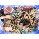 An extensive collection of costume jewellery including vintage and modern items, hardstone pendants,