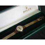 A Ladies Rolex Precision watch in 9ct gold.