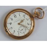A 14ct gold top wind pocket watch having white enamel dial with subsidiary seconds dial, movement,