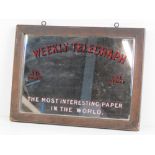 A vintage advertising mirror 'Weekly Telegraph the most interesting paper in the world', oak frame,