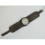 A WWI trench watch having silver screw-on front and back case with import marks for London 1918,