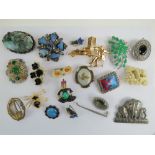 A quantity of assorted 20th century costume jewellery brooches including;