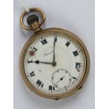 A 9ct gold top wind open face pocket watch having white enamel dial (enamel a/f) with subsidiary