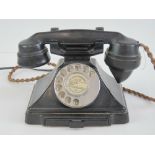 A vintage GPO black Bakelite telephone stamped to the base 1/232L, FWR582. Wired for modern day use.