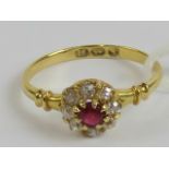 A vintage 18ct gold ruby and diamond floral cluster ring,
