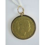 A rare 22ct gold George III 1818 full sovereign, 8g, in a plain 9ct gold loose necklace mount,
