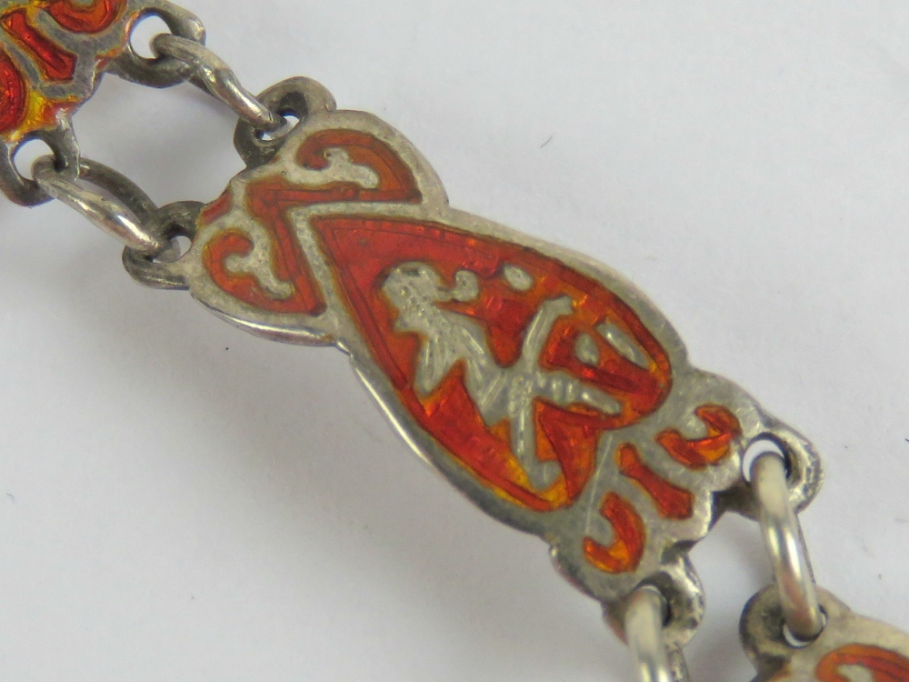 A sterling silver and red enamelled brac - Image 2 of 2