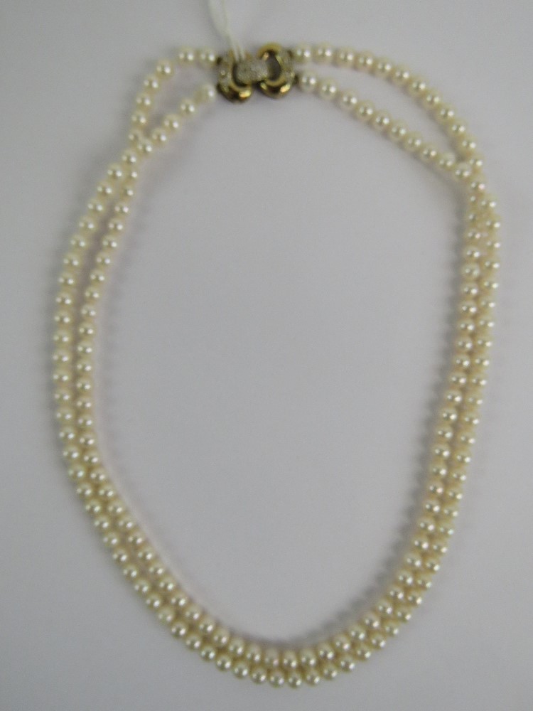 A double strand cultured pearl necklet,