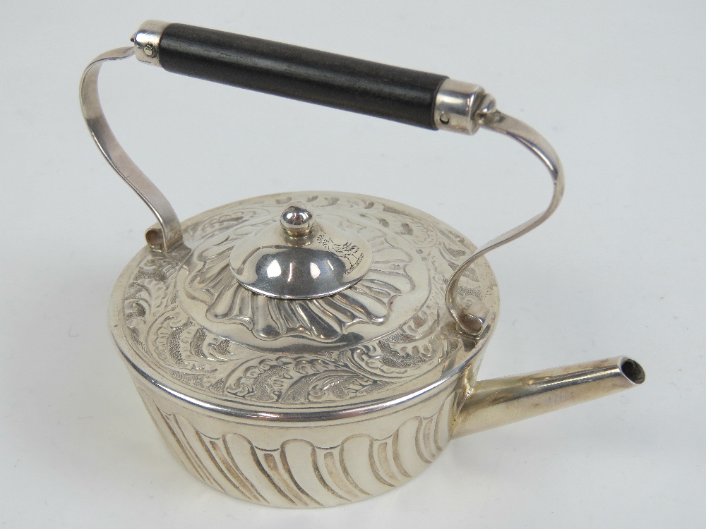 A miniature HM silver kettle made by Geo