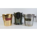 Three metal branded champagne ice bucket