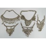 Three Indian white metal articulated bra