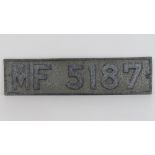 A vintage decorative car registration pl