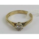 A 9ct gold diamond solitaire, the round