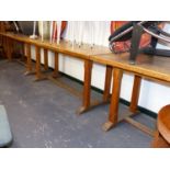 A MATCHING SET OF THREE HEALS STYLE ARTS AND CRAFTS OAK BASED SIDE TABLES, EACH MEASURING APPROX.