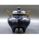 A JAPANESE MIDNIGHT BLUE CLOISONNE CENSER AND COVER, THE LATTER WORKED WITH CHRYSANTHEMUMS AND