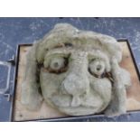 A LARGE COMPOSTITE STONE GARGOYLE GROTESQUE.