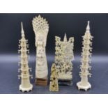 A PAIR OF CARVED CHINESE IVORY PAGODAS. H.23.5cms. A MOUNTAIN SCENE TOPPED BY A PAGODA. H.16.5cms. A