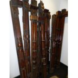 A SET OF 12 LARGE OAK DOOR FRAME SUPPORTS WITH SPLIT TURNED DECORATION. FORMALLY IN DRAPERS HALL,
