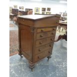 A Wm.IV ROSEWOOD DAVENPORT DESK WITH PULL OUT SLIDES AND FITTED DRAWERS. W.51 x H.89cms.