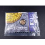 A UK PROOF MILLENNIUM ISSUE HALF SOVEREIGN GOLD COIN.
