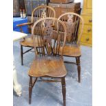 A SET OF SEVEN 19th.C.STYLE WINDSOR WHEELBACK CHAIRS TO INCLUDE THREE ARMCHAIRS.