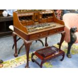 A GEORGIAN STYLE MAHOGANY WRITING DESK WITH RAISED PIGEONHOLES AND DRAWERS OVER TWO FRIEZE DRAWERS