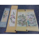 FOUR CHINESE SCROLL PAINTINGS. ONE OF BLOSSOM, BIRDS AMIDST BAMBOO, A MOUNTAIN LANDSCAPE AND YOUNG