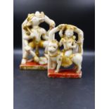 AN INDIAN WHITE MARBLE CARVING OF NANDI QUELLING A RAM'S HEAD FIGURE. H.24cms AND ANOTHER OF DURGA