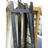 TWO PAINTED FOLDING DISPLAY EASELS.