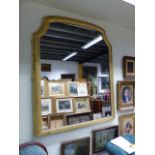 A GILDED OVERMANTLE MIRROR 132CM H X 106 CM W.