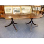 AN ANTIQUE MAHOGANY AND INLAID TWIN PEDESTAL DINING TABLE ON SABRE LEGS WITH BRASS CASTORS. 197 x