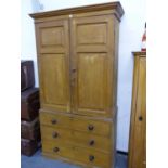 A VICTORIAN COUNTRY PINE HOUSEKEEPER'S CUPBOARD WITH SCUMBLE PAINT DECORATION, TWO PANEL DOORS