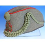 A QUEEN'S WESTMINSTER RIFLES VOLUNTEERS BUSBY OR SIDE CAP WITH STORAGE BAG AND PHOTOGRAPHS.